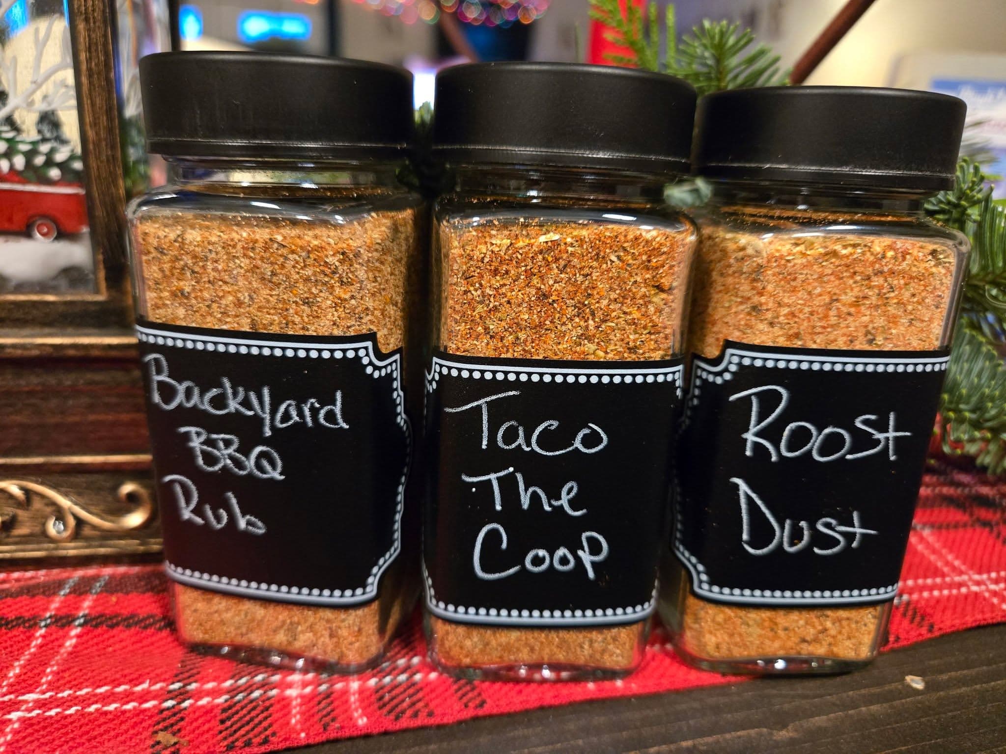 Three labeled jars of handmade seasonings